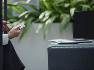 A relaxed businessman enjoying a break in his bright, contemporary office environment.